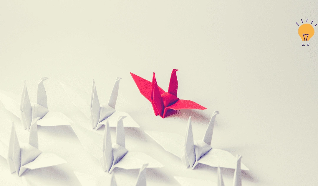 origami birds and one is red and the other white