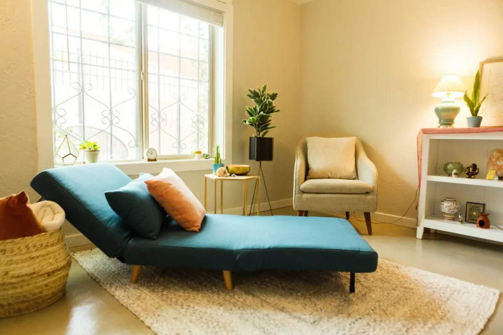 A session room with a chaise and chair